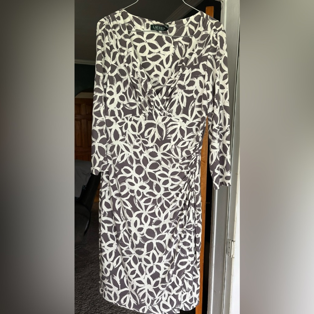 Beautiful dress. Never worn. Perfect for work, evening out or wedding/events